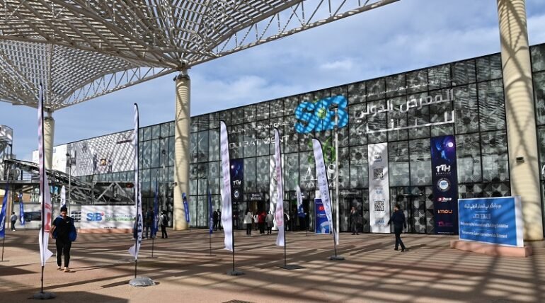Custom-designed exhibition booth at SIB 2026 in El Jadida by ExhibitStandBuilder.